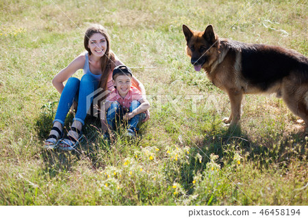 beautiful woman schools a German Shepherd Dog friend 46458194