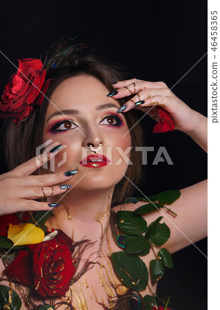 Portrait of girl with roses 46458365