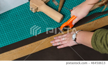 Tanner cuts off leather blank Tanner cuts off leather blank 46458613