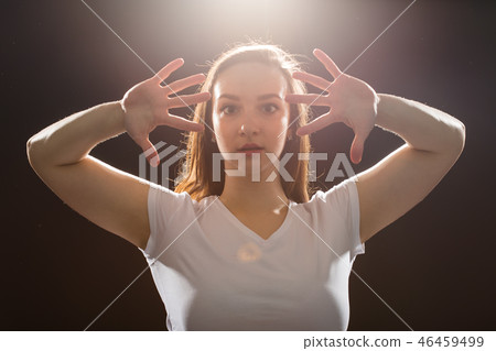 Hip-hop, jazz-funk, tecktonik, waacking, trance and street dances concept - Young woman dancing jazz 46459499