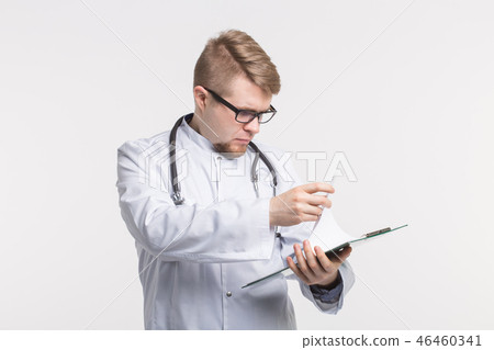 Male medicine doctor hand looking something on clipboard on white background. 46460341