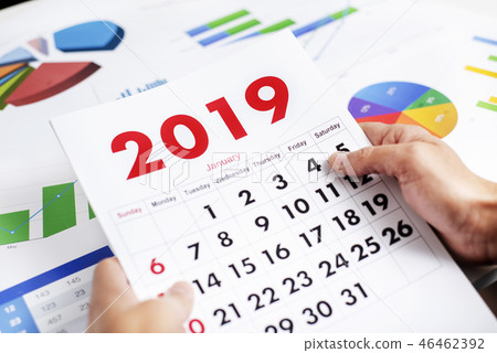 man with a calendar of 2019 man with a calendar of 2019 46462392