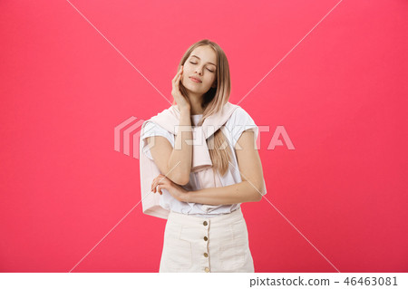 side view of a casual young woman looking away from the camera 46463081