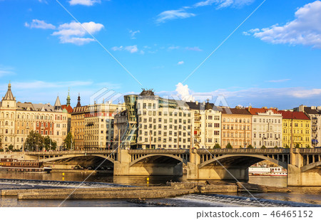 Dancing House in Prague and Jirasek Bridge bridge over the Vltav Dancing House in Prague and Jirasek Bridge bridge over the Vltav 46465152