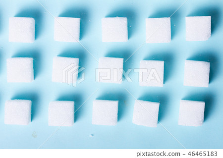 Sugar on blue background Sugar on blue background 46465183