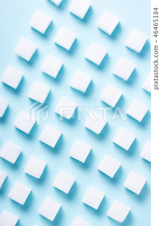 Sugar on blue background Sugar on blue background 46465184
