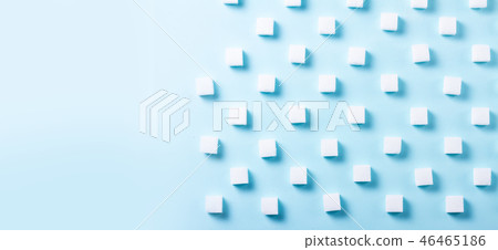 Sugar on blue background Sugar on blue background 46465186