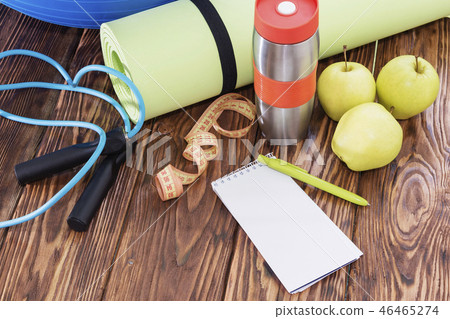 yoga Mat and water bottle close-up. yoga Mat and water bottle close-up. 46465274