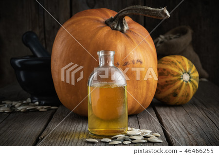 Pumpkin seeds oil bottle, pumpkins, bag of seeds. 46466255