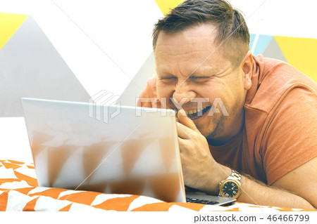 man and laptop 46466799