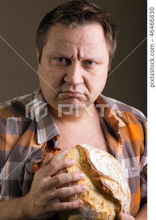 man and loaf of bread man and loaf of bread 46466830