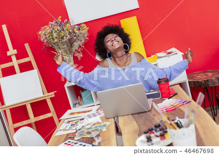 Interior designer feeling happy after finishing important project 46467698