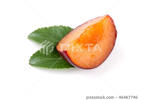 Purple plum slice with leaves isolated on white background Purple plum slice with leaves isolated on white background 46467746