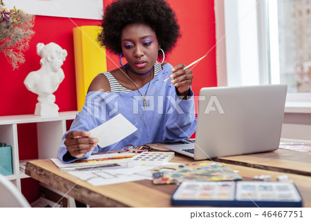 Interior designer wearing stylish clothes feeling overloaded with work Interior designer wearing stylish clothes feeling overloaded with work 46467751