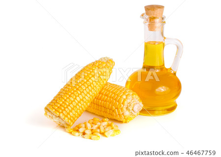 Corn oil in decanter, fresh corn cobs and grains isolated on white background 46467759
