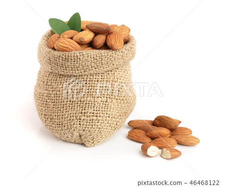 Almonds with leaf in bag from sacking isolated on white background Almonds with leaf in bag from sacking isolated on white background 46468122