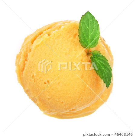 Yellow ice cream with a mint leaf top view isolated on white background 46468146