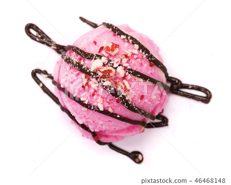 Strawberry ice cream ball with melted chocolate and nuts isolated on white background, top view 46468148