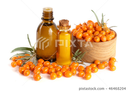 Sea-buckthorn oil with berries and leaves isolated on white background Sea-buckthorn oil with berries and leaves isolated on white background 46468204