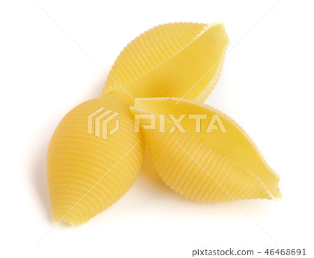 pasta in the shape of a shell isolated on white background close up pasta in the shape of a shell isolated on white background close up 46468691