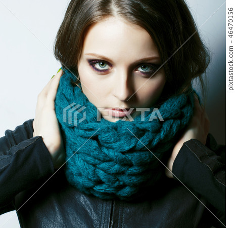 young pretty real woman in sweater and scarf all over her face s young pretty real woman in sweater and scarf all over her face s 46470156
