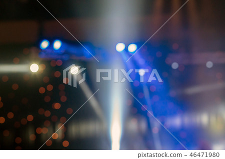 Abstract blurred photo of spotlight in conference hall, seminar and party environment concept Abstract blurred photo of spotlight in conference hall, seminar and party environment concept 46471980