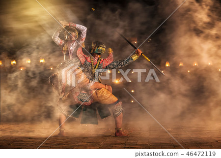 Khon, pantomime performances action of Thailand, a kind of Thai drama, Hanuman Monkey fighting with Giant at Ayutthaya temple at night, performing action concept 46472119