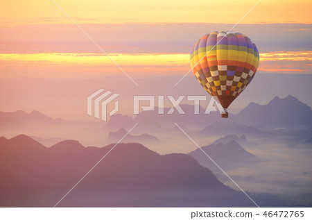 Hot air balloon over the sea of mist. 46472765