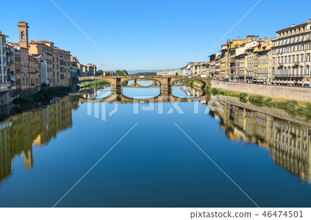 Trinity Bridge over river Arno at sunny day 46474501