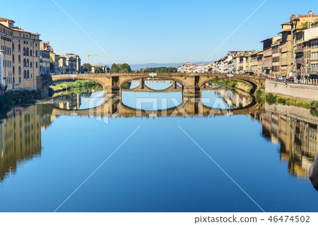 Trinity Bridge over river Arno at sunny day Trinity Bridge over river Arno at sunny day 46474502