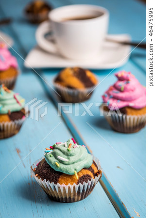Chocolate cupcake with cream 46475995