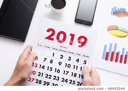 man with a calendar of 2019 46485844