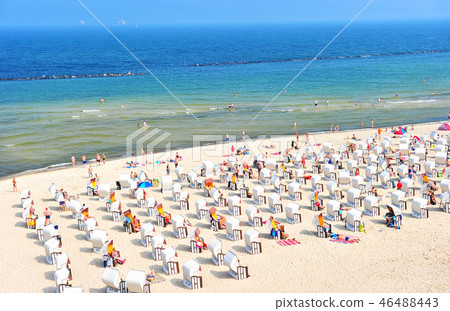 Baltic Sea beach tourists sunbeds umbrellas Travel 46488443