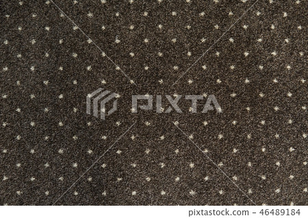 Brown carpet with a white dots texture. Indoor carpeting shoot in daylight. 46489184