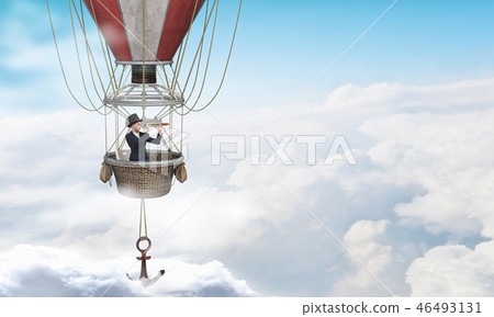Woman traveling in aerostat Woman traveling in aerostat 46493131
