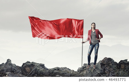 Woman holding red flag Woman holding red flag 46493771