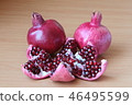 Ripe pomegranates cut into pieces 46495599