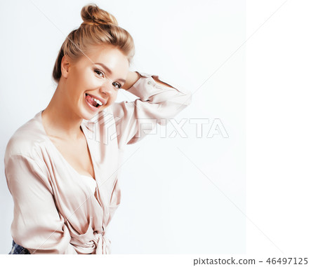 young pretty blond woman in bed covered white sheets smiling che 46497125