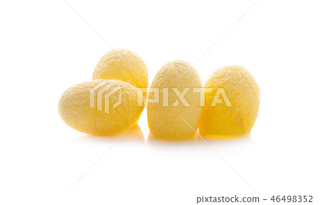 yellow thai silkworm cocoons pile isolated 46498352
