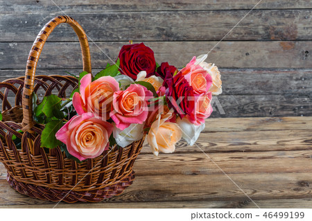 Roses in basket 46499199