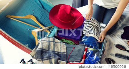 girl packing the luggage prepare for her trip girl packing the luggage prepare for her trip 46500026