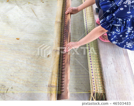 The hands of women woven mats traditional. 46503483