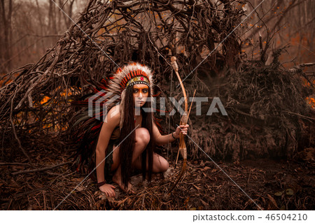 Native american. Indian woman in traditional dress Native american. Indian woman in traditional dress 46504210