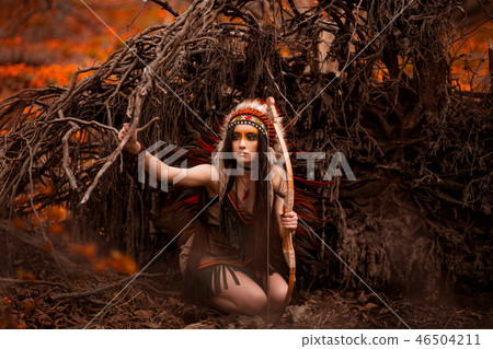 Native american. Indian woman in traditional dress Native american. Indian woman in traditional dress 46504211