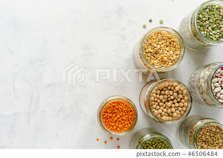 Colorful healthy dried legumes in glass jars 46506484