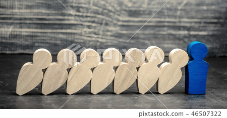 Leader businessman stops falling dominoes. 46507322
