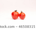 pair of cherry tomatoes in love on a white background 46508315