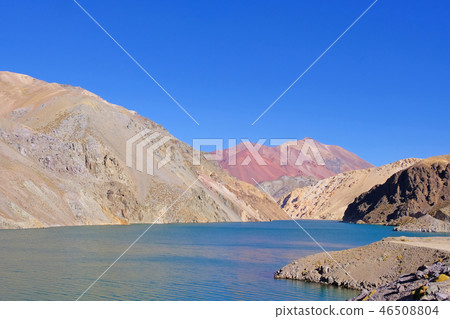 Laguna Agua Negra lagoon with andean mountains at the road to the Paso Agua De Negra, Elqui valley 46508804