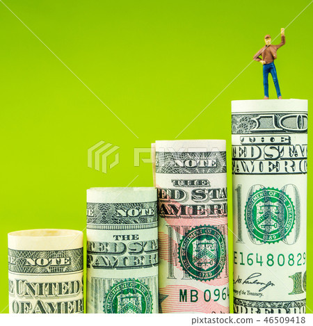 miniature figurine with victory gesture on dollar 46509418