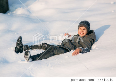 Little boy in snow. Winter weather. Holiday. Christmas 46510010
